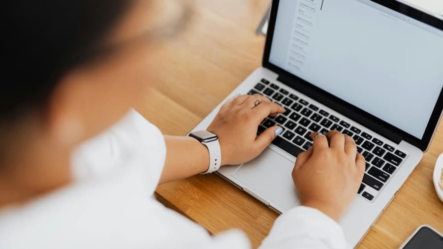 A student working through the course on their laptop at their own pace